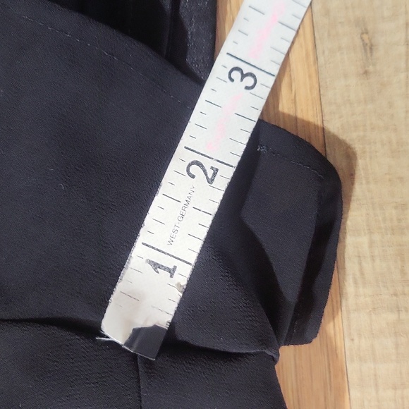 ASTR The Label - Black Sheer Overlay V-Neck Sleeveless Ruffle Embellished Romper - Picture 14 of 16